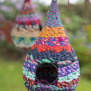 Eco friendly bird house made from recycled sari's and metal